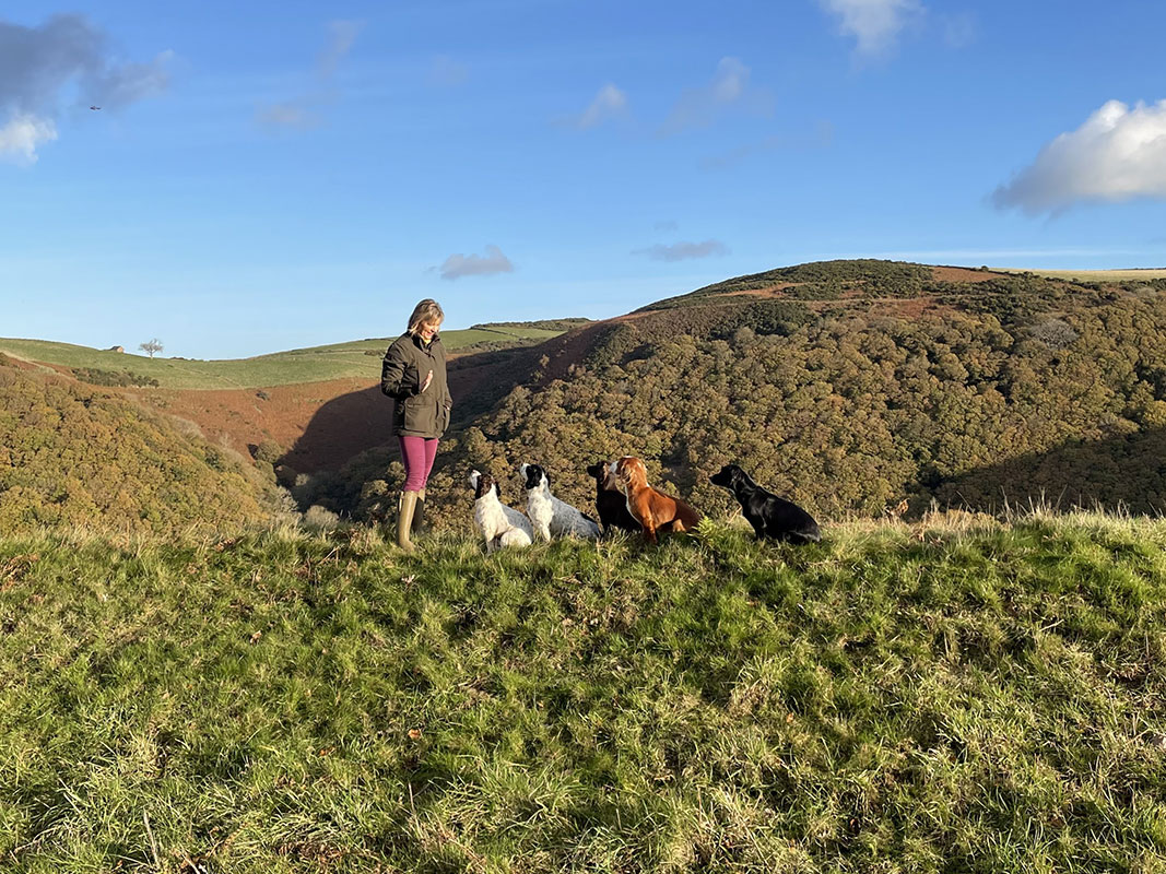 K9 Dog Training, Jacqui Skelton-Norrish, with her five dogs in the country side